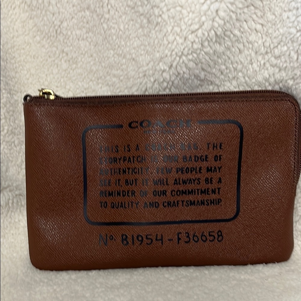 Authentic slightly used Coach pouch